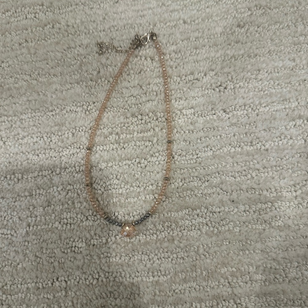 literally love this necklace just doesn’t go with the one i wear most!